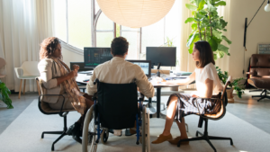 Coworkers meeting around a conference table