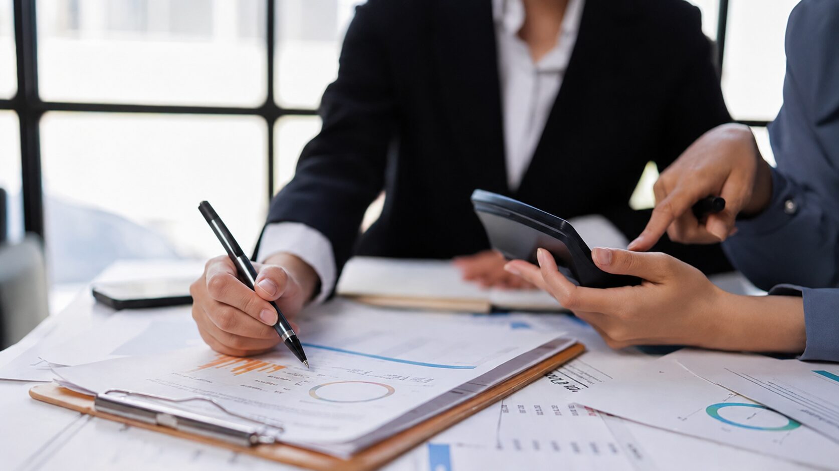 HR leader reviewing workplace misconduct documentation and cost data during an organizational risk assessment