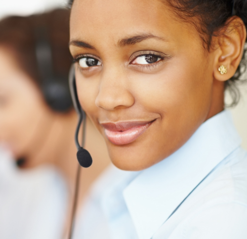 woman on headset sending wellness message to employees